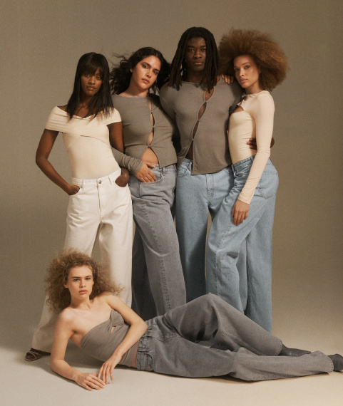 group of women wearing beige and white tops made with circulose by hanna mw in front of beige grey backdrop